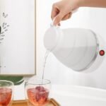 ⁦Bouilloire électrique pliable en silicone ,portable Avec  indicateur de mise hors tension غلاية كهربائية قابلة للطي محمولة سيليكون⁩ - الصورة ⁦6⁩