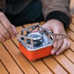 ⁦Mini réchaud à gaz pliable en métal pour camping - موقد غاز محمول⁩ - الصورة ⁦3⁩