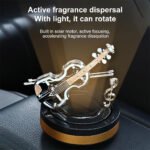 ⁦Diffuseur de parfum pour voiture aspect violon rotatif - موزع العطر في السيارة⁩ - الصورة ⁦3⁩