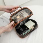 ⁦Trousse de toilette transparente double couche pour femmes, sac cosmétique étanche de grande capacité⁩ - الصورة ⁦2⁩