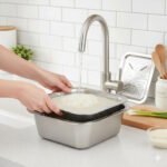 ⁦Râpe multifonctionnelle Delaval en acier inoxydable avec panier d’égouttage 3EN1 – مفرمة وقطاعة خضر متعددة الإستعمالات⁩ - الصورة ⁦10⁩