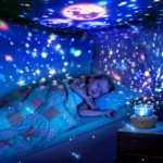 ⁦Projecteur Veilleuse Système Solaire pour Enfants Rotation à 360° + 5 Films Planètes - جهاز عرض النجوم "ستار-دريم" للأطفال⁩ - الصورة ⁦7⁩