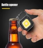 ⁦Mini Lampe de Poche COB LED Portable Rechargeable avec Trépied - مصباح متعدد الوظائف مع حامل⁩ - الصورة ⁦6⁩